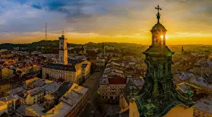 Lwow Prints: Lviv, Ukraine - August 24, 2020: Aerial view on City Hall and Latin Cathedral in Lviv