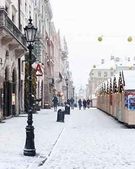 Lwow Prints: Lviv in winter time. Picturesque evening view on christmas fair on city center