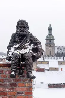 Lviv in winter time. Picturesque view on Lviv city center from top of old roof of restaurant House of legend. Eastern Europe, Ukraine