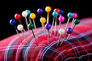 Cushion Prints: macro colored sewing pins in scottish pincushion