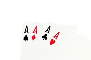 Spade Prints: Macro shot of four aces over white