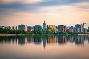 Madison, Wisconsin, USA downtown skyline at dusk on Lake Monona
