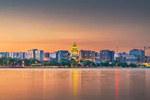 Madison, Wisconsin, USA downtown skyline at dusk on Lake Monona