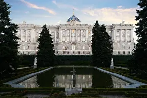 Palacio Prints: Madrid landmark at night. Landscape of Royal Palace and Sabatini gardensat dusk