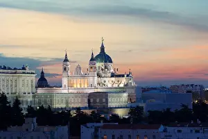 Madrid landmark at night. Landscape of Santa Maria la Real de La Almudena Cathedral and the Royal Palace. Beautiful skyline at Madrid, Spain