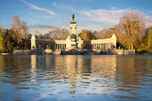 Madrid landmark. Sunset time at the memorial in Retiro city park, Madrid, Spain. Beautiful sky during summer sunset