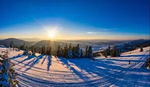 Magical winter panorama of beautiful snowy slopes