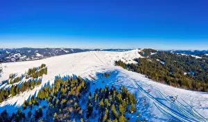 Magical winter panorama of beautiful snowy slopes