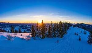 Magical winter panorama of beautiful snowy slopes
