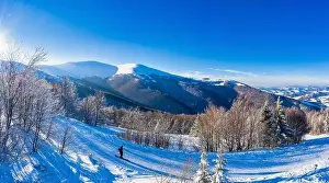 Magical winter panorama of beautiful snowy slopes