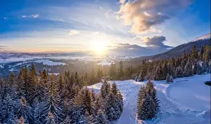 Wintersport Prints: Magical winter panorama of beautiful snowy slopes at a ski resort in Europe on a sunny