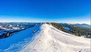 Wintersport Prints: Magical winter panorama of beautiful snowy slopes at a ski resort in Europe on a sunny