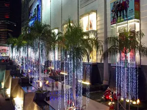 South East Prints: Magically lit palm tree covered walkway leading to the Siam Paragon shopping mall