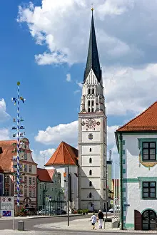 Incidental Prints: Main square mit maypole, parish church St