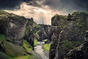 Stone Stream Prints: Majestic Fjadrargljufur canyon with river Fjadra flowing through and dramatic sky in summer at Iceland