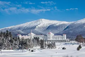 New Hampshire Prints: Majestic Mount Washington Hotel located in the White Mountain National Forest during winter in Bretton Woods