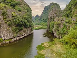 Mountain River Prints: the majestic scenery on Ngo Dong river in Tam Coc Bich Dong view from drone in Ninh Binh province of Viet Nam