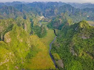 Mountain River Prints: the majestic scenery on Ngo Dong river in Tam Coc Bich Dong view from drone in Ninh Binh province of Viet Nam