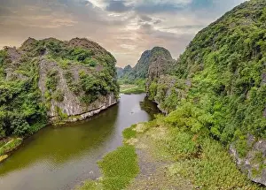 Mountain River Prints: the majestic scenery on Ngo Dong river in Tam Coc Bich Dong view from drone in Ninh Binh province of Viet Nam