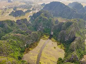 Mountain River Prints: the majestic scenery on Ngo Dong river in Tam Coc Bich Dong view from drone in Ninh Binh province of Viet Nam