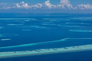 Maldives Beach Reef Sand. taken from different beaches of islands located in Maldives. Aerial view of coral sand cay on Great Barrier Reef, Queensland