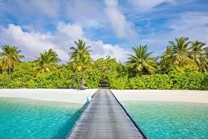 Images Dated 26th May 2019: Maldives island, luxury resort, wooden pier into paradise beach. Beautiful sky