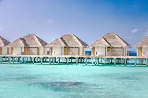 Maldives Island Prints: Maldives island water bungalows resort at islands beach