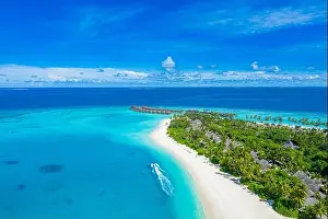 Maldives paradise scenery. Tropical aerial landscape, seascape with long jetty water villas with amazing sea and lagoon beach, tropical nature. Exotic
