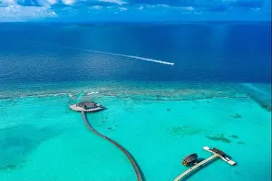 Maldives paradise scenery. Tropical aerial landscape, seascape, water villas amazing sea and lagoon beach tropical nature. Exotic vacation destination