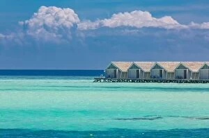 Images Dated 12th January 2017: Maldivian water bungalows. Luxury travel background, exotic over water villas