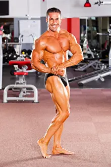 Bodybuilding Prints: male bodybuilder posing in gym