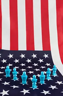 American Flag Prints: Male and Female figurines on USA flag
