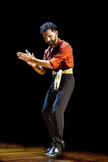 Intense Prints: A male flamenco dancer, dressed in a red shirt