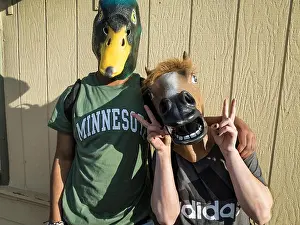 Masks Prints: Mallard duck and horse partners posing for pictures as they stroll down the street