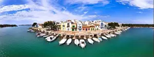 Mallorca island landmarks. Scenic fishing village Portocolom with colorful houses and boats