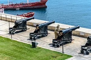 Saluting Prints: Maltese soldier prepares to fire from cannon