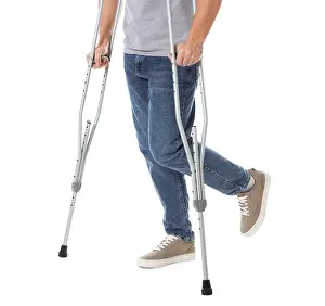 Hurt Prints: Man with axillary crutches on white background, closeup