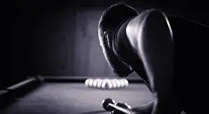 Nightlife Prints: A man with a beard plays a big billiard. Party in a 12-foot pool