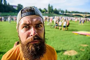 Moments Prints: Man bearded hipster in front of crowd