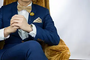Handkerchief Prints: Man in blue suit with coffee cream bowtie color