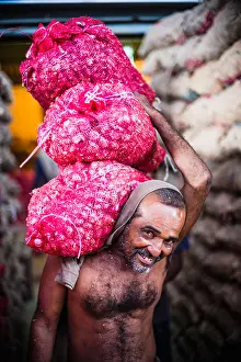 One Man Only Prints: Man carrying vegetables at Dambulla vegetable and produce market in Dambulla