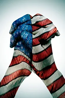 American Flag Prints: man clasped hands patterned with the american flag