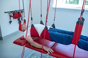 Belt Prints: Man with closed eyes on rehabilitation at medical center
