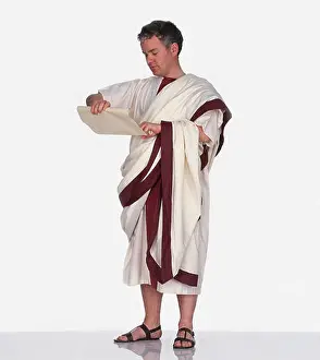 Sandal Prints: Man dressed as Roman citizen wearing toga and holding scroll of paper
