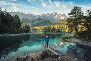 Karwendel Prints: Man enjoying the amazing morning scenery at a gorgeous lake in the Bavarian Alps