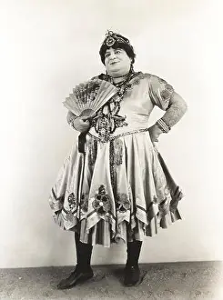 Three Quarter Length Prints: Man with fan dressed in women's clothing, 1920s