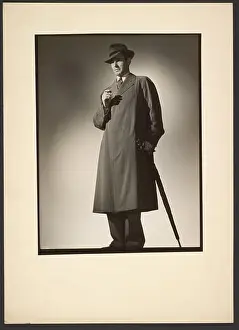 1943 Prints: Man modeling trench coat. Günther Krampf