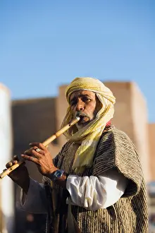 45 50 Years Prints: Man Playing Flute In Essaouira, Morocco