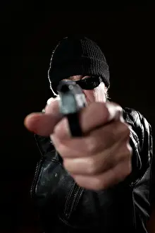 Threat Prints: Man pointing with gun