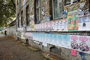 Paste Prints: Man putting up posters